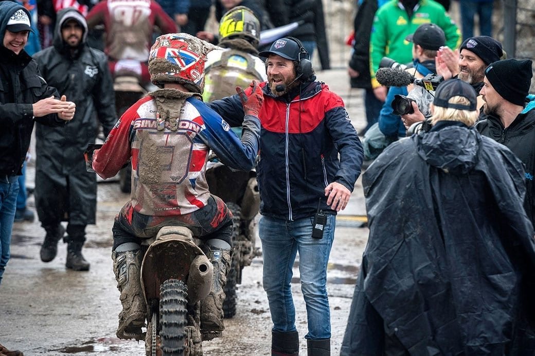 Mark Chamberlain goes in for a bear hug on Shaun Simpson after his two epic Assen rides