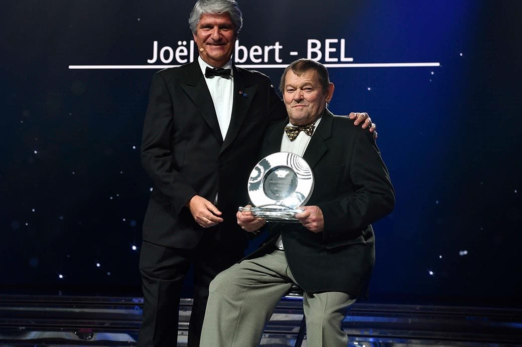Joël Robert being awarded the title of FIM Motocross Legend at the FIM Awards 2019 in Monaco by the FIM President Jorge Viegas